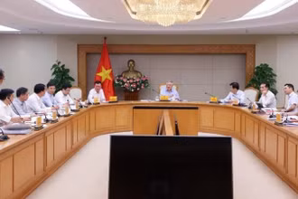 Phó Thủ tướng Thường trực Chính phủ Nguyễn Hòa Bình chủ trì cuộc họp. (Ảnh: TTXVN)