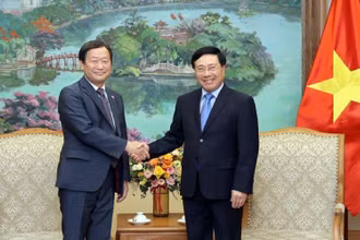 Phó Thủ tướng Thường trực Chính phủ Phạm Bình Minh tiếp Phó Chủ tịch điều hành cấp cao Cơ quan Hợp tác quốc tế Nhật Bản (JICA) Junichi Yamada. Ảnh: VGP