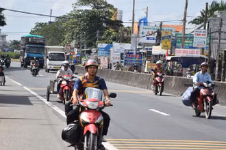 Một đoạn quốc lộ 1 qua xã An Hữu, huyện Cái Bè được tỉnh Tiền Giang triển khai tuyến đường kiểu mẫu an toàn giao thông.