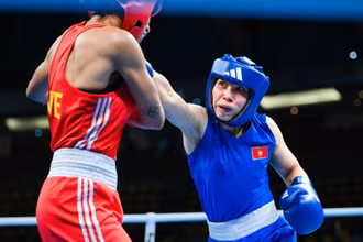 Võ sĩ Hà Thị Linh thi đấu tại Olympic Paris 2024. 