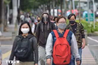 Người dân đeo khẩu trang để phóng HMPV. (Ảnh minh họa từ TTXVN/Xinhua)