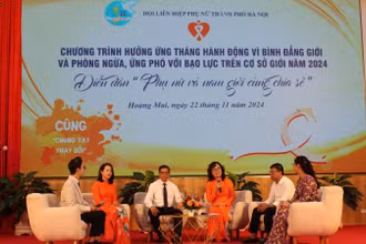 Các đại biểu tham gia diễn đàn "Phụ nữ và nam giới cùng chia sẻ”.