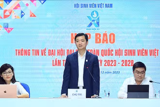 Đồng chí Nguyễn Minh Triết thông tin về Đại hội tại họp báo.