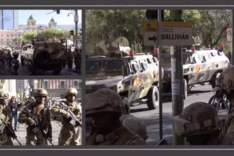 Hình ảnh binh sỹ Bolivia tràn vào quảng trường Murillo ở La Paz. (Ảnh cắt từ clip của Reuters)