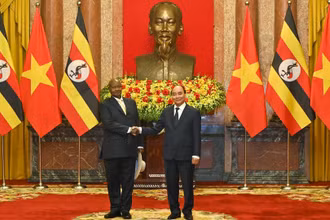Chủ tịch nước Nguyễn Xuân Phúc và Tổng thống Uganda Yoweri Kaguta Museveni.