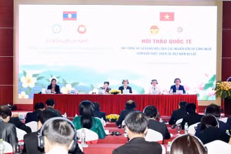 Hội thảo “Huy động và sử dụng hiệu quả các nguồn vốn và công nghệ bảo đảm phát triển nhanh và bền vững tại Việt Nam và Lào”. (Ảnh: QUỐC HỒNG)