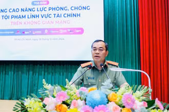 Đại tá Lê Quang Đạo, Phó Giám đốc Công an Thành phố Hồ Chí Minh phát biểu khai mạc tọa đàm.