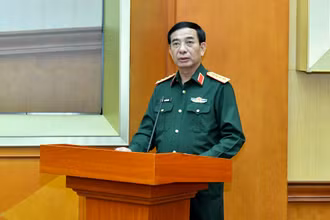 Đại tướng Phan Văn Giang, Ủy viên Bộ Chính trị, Phó Bí thư Quân ủy Trung ương, Bộ trưởng Quốc phòng phát biểu khai mạc hội nghị. Ảnh: ĐĂNG KHOA 