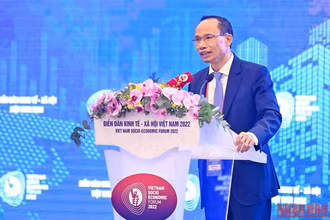 Tiến sĩ Cấn Văn Lực, chuyên gia kinh tế trưởng BIDV phát biểu trong Phiên toàn thể Diễn đàn kinh tế-xã hội Việt Nam 2022 chiều 18/9. 