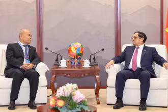 Thủ tướng Phạm Minh Chính tiếp ông Trần Vân, Chủ tịch Hội đồng Quản trị Tập đoàn Đường sắt Trung Quốc. (Ảnh: NHẬT BẮC)