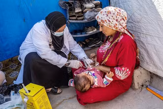 Tiêm vắc-xin cho trẻ em tại vùng Kurdistan, Iraq. (Ảnh UNICEF)