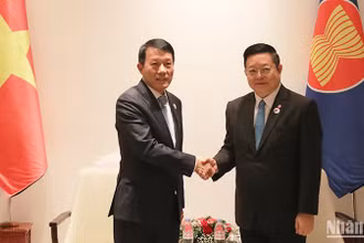 Bộ trưởng Công an Lương Tam Quang và Tổng Thư ký ASEAN Kao Kim Hourn. (Ảnh: Hải Tiến)