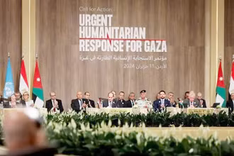 Phiên toàn thể Hội nghị viện trợ khẩn cấp cho Gaza diễn ra tại Jordan. (Ảnh REUTERS)