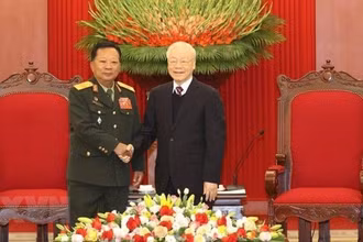 Tổng Bí thư Nguyễn Phú Trọng tiếp Đại tướng Chansamon Chanylath - Ủy viên Bộ Chính trị, Phó Thủ tướng, Bộ trưởng Bộ Quốc phòng Lào tại Trụ sở Trung ương Đảng, chiều 7/12/2022. (Ảnh: Trí Dũng/TTXVN)