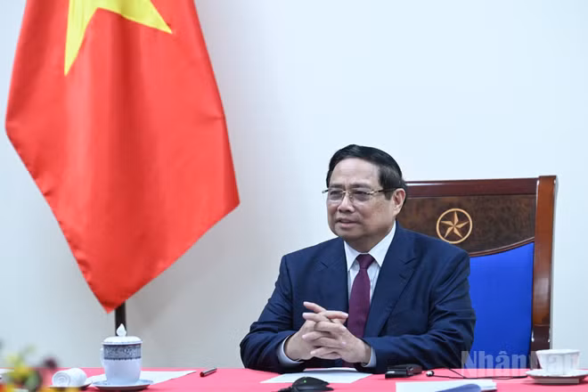 Thủ tướng Chính phủ Phạm Minh Chính điện đàm với Thủ tướng Algeria Sifi Ghrieb. (Ảnh: Trần Hải)