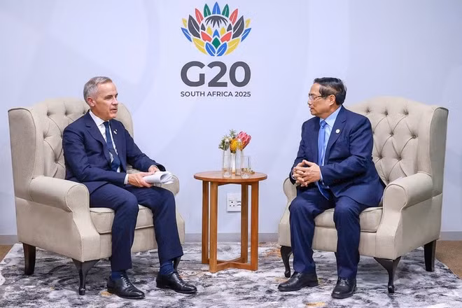 Thủ tướng Phạm Minh Chính và Thủ tướng Canada Mark Carney. (Ảnh: VGP/Nhật Bắc)