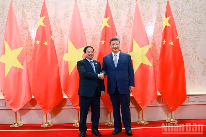 Thủ tướng Chính phủ Phạm Minh Chính và Tổng Bí thư, Chủ tịch Tập Cận Bình. (Ảnh: Nhật Bắc)