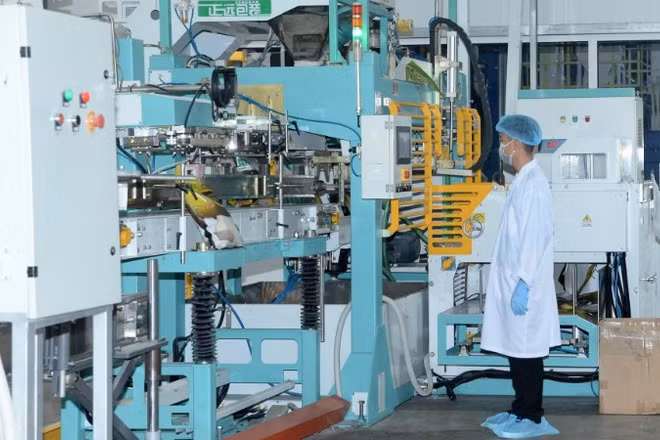 Dây chuyền chế biến gạo của Công ty TNHH Lúa gạo Việt Nam (Vinarice). (Ảnh: ĐỨC AN)