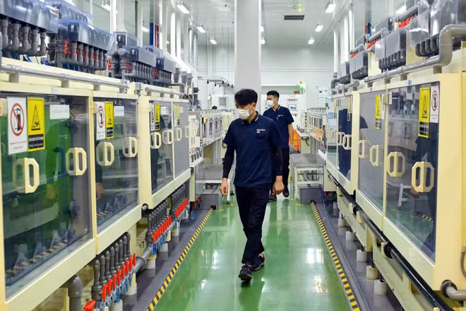 Sản xuất bảng mạch, thiết bị bảng mạch điện tử ở Công ty Trách nhiệm hữu hạn Doosan Electro-Materials Việt Nam (FDI Hàn Quốc) tại thành phố Hải Phòng. (Ảnh: ĐĂNG ANH)