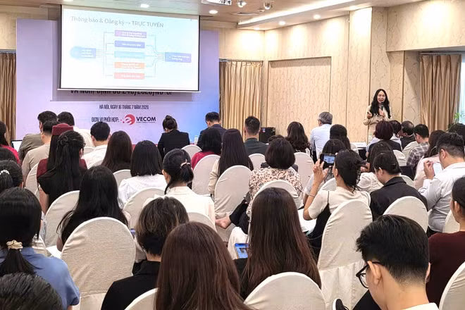 Hội nghị giới thiệu những điểm mới của Luật Thương mại điện tử và các văn bản hướng dẫn thi hành. (Ảnh: KIM DUNG)