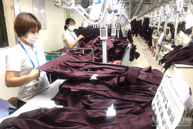 Hà Nội cần tạo môi trường cho doanh nghiệp phát triển, khơi thông nguồn lực tăng trưởng. (Ảnh: KIM DUNG)