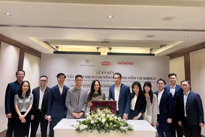 Đại diện Tập đoàn PAN và đại diện Momogi Group tại lễ ký kết hoàn tất giao dịch chuyển nhượng vốn tại Bibica.