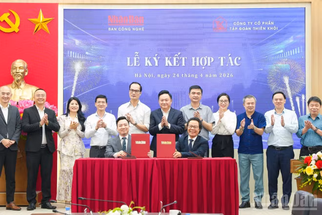 Ký kết hợp tác giữa Báo Nhân Dân và Công ty cổ phần Tập đoàn Thiên Khôi. (Ảnh: Tiến Đạt)