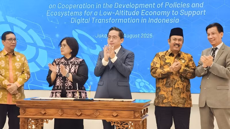 hinh-1-ky-ket-indo-1433.jpg