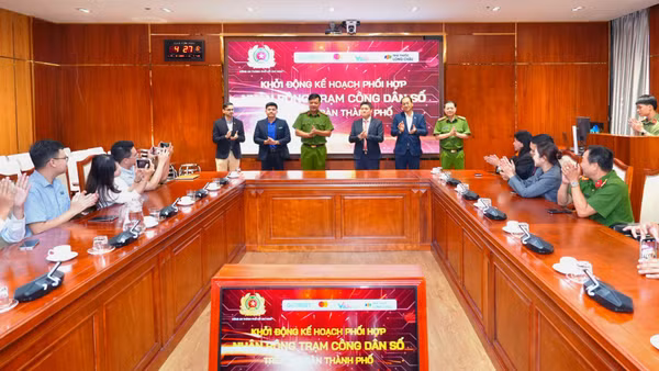 Lễ ký kết Kế hoạch phối hợp nhân rộng mô hình Trạm công dân số trên địa bàn Thành phố Hồ Chí Minh. (Ảnh: H.Khánh)