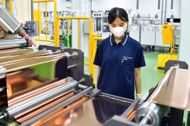  Sản xuất bảng mạch, thiết bị bảng mạch điện tử ở Công ty Trách nhiệm hữu hạn Doosan Electro-Materials Việt Nam (FDI Hàn Quốc) tại thành phố Hải Phòng. (Ảnh: ĐĂNG ANH) 