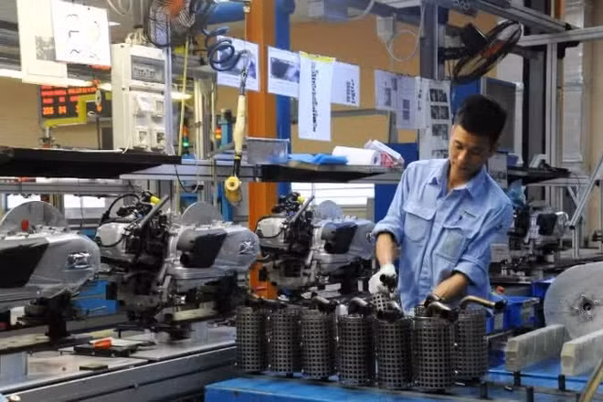Dây chuyền sản xuất và lắp ráp xe máy ở Công ty Trách nhiệm hữu hạn Piaggio Việt Nam (Khu công nghiệp Bình Xuyên, tỉnh Vĩnh Phúc). (Ảnh: TRẦN HẢI)