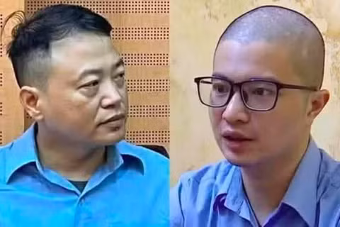 Nguyễn Hòa Bình và Phó Đức Nam. (Ảnh: Bộ Công an)