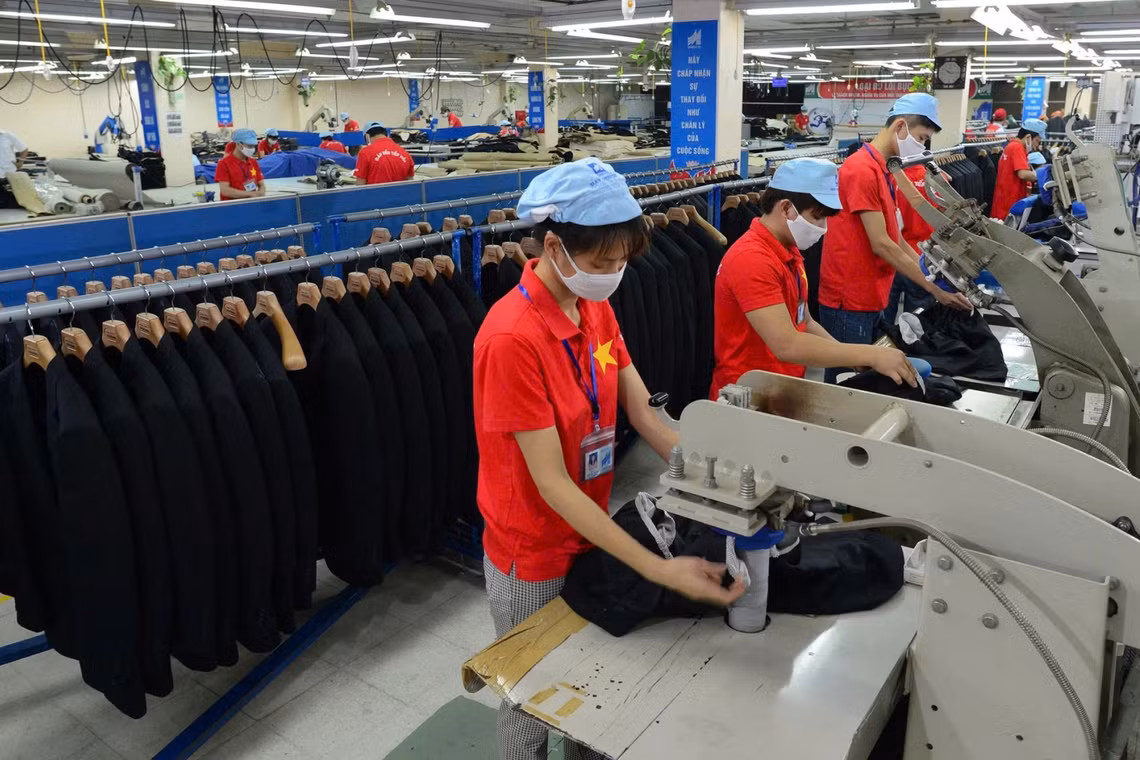 Lao động nữ tại Tổng Công ty May 10, Hà Nội. (Ảnh HOÀNG HUY)