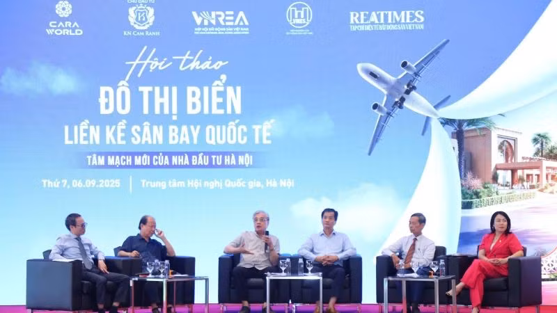 Các diễn giả trao đổi, thảo luận tại Hội thảo. (Ảnh: PV)