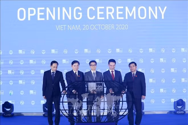 Nước chủ nhà Việt Nam bấm nút khai mạc Hội nghị và Triển lãm Thế giới số (ITU Digital World) 2020. Ảnh: TTXVN.