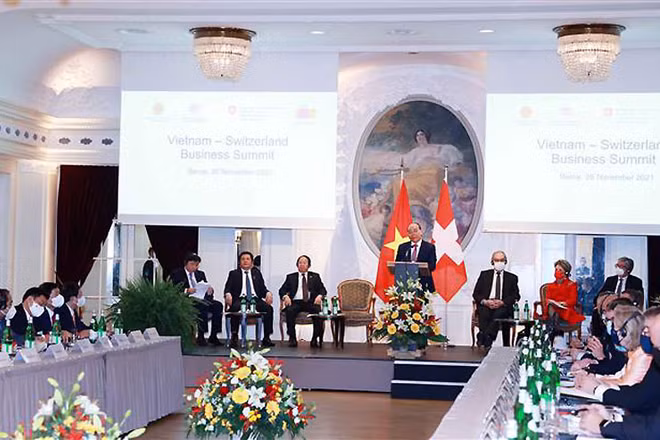 Chủ tịch nước Nguyễn Xuân Phúc phát biểu tại Diễn đàn Doanh nghiệp Việt Nam - Thụy Sĩ. (Ảnh: TTXVN)