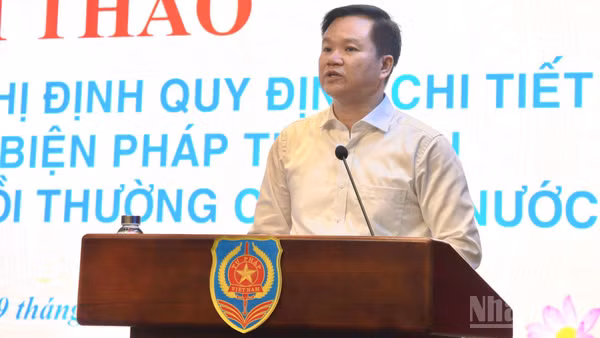 Đại diện lãnh đạo Cục Đăng ký giao dịch bảo đảm và Bồi thường Nhà nước, Bộ Tư pháp. (Ảnh: HN)