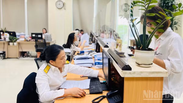 Đẩy nhanh giải quyết thủ tục, giảm thời gian và chi phí tuân thủ cho người nộp thuế. (Ảnh: MINH PHƯƠNG)