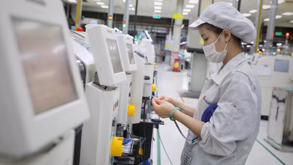 Việt Nam tiếp tục cải thiện môi trường kinh doanh nhằm thu hút hiệu quả dòng vốn đầu tư nước ngoài. (Ảnh: Lê Danh Lam) 