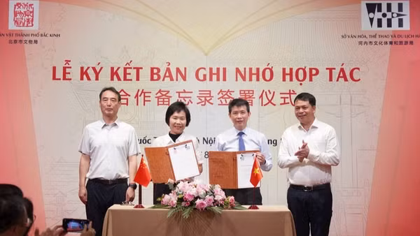 Các đại biểu tham gia lễ ký kết hợp tác. (Ảnh: Hoàng Lân)