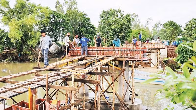 Cầu bắc qua Kênh 2 khi hoàn thành sẽ giúp nông dân vận chuyển hàng hóa, nông sản thuận lợi.