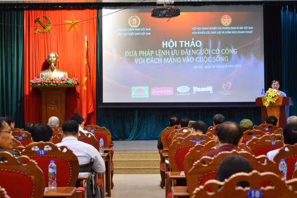 Quang cảnh hội thảo “Đưa Pháp lệnh Ưu đãi người có công với cách mạng vào cuộc sống”. (Ảnh: VŨ MINH)