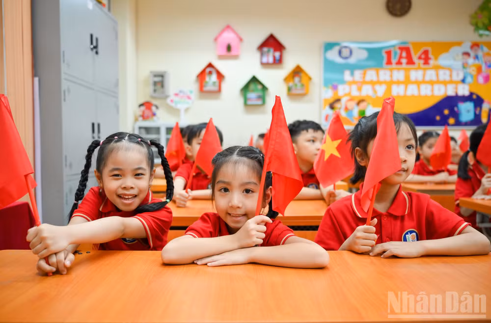 Học sinh Trường tiểu học Nhân Chính, Hà Nội trong lễ khai giảng năm học mới 2026-2027. (Ảnh: THẾ ĐẠI)