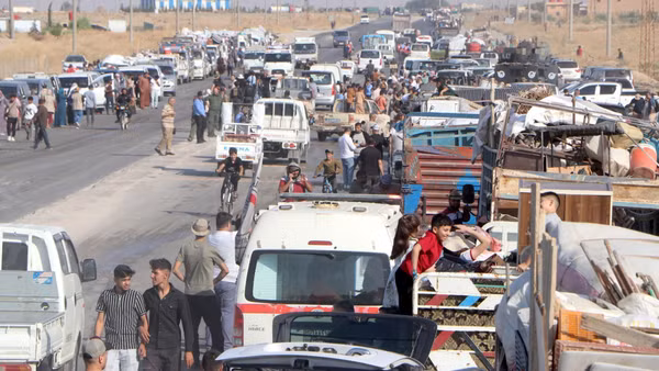 Người tị nạn Syria trở về nhà ở thành phố Ras al-Ain, ngày 10/8/2026. (Ảnh: THX/TTXVN phát)