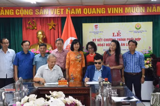 Lễ ký kết phối hợp hoạt động tri ân liệt sĩ.