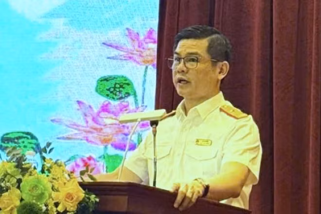 Phó Cục trưởng Cục Thuế Vũ Chí Hùng phát biểu khai mạc hội thảo.